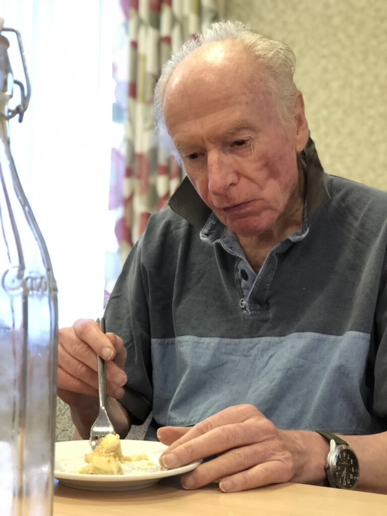 Alan eating lunch in the restaurant